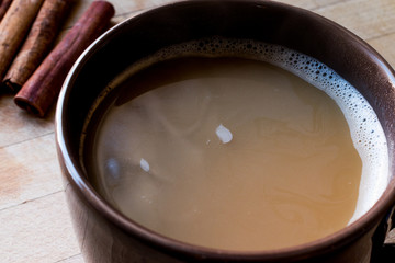 Masala Chai Tea in a big brown Cup.