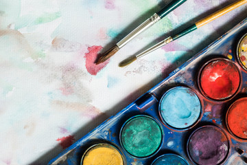 Watercolor and paintbrush painting on the white canvas background.