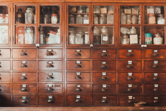 herbal shop or Chinese herb store dried wooden antique cupboard for medical drug storage