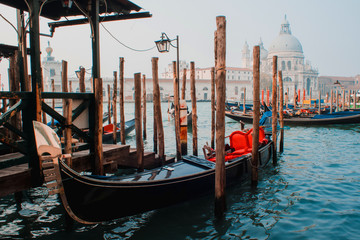 Cathedral of Santa Maria della Salute and gondola in the foreground in Venice, Italy