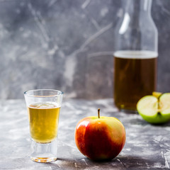 Apple cider drink in a bottle. Selective focus, space for text. 