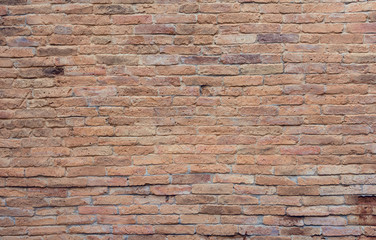 Old red brick wall texture background. Rough surface wall.