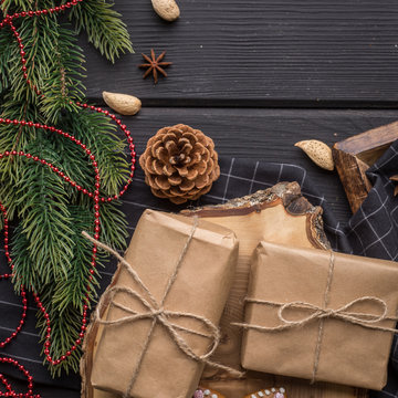 Christmas gifts on black wooden