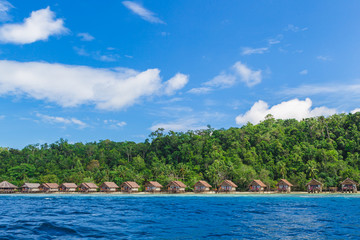 Fototapeta na wymiar Bungalows in Raja Ampat, West Papua, Indonesia.