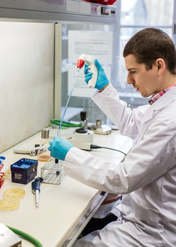 Man Working in a Sterile Lab Environment