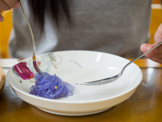Asian woman enjoy eating delicious meal