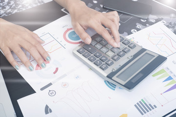 business accountant with document graph making calculations financial. concept planning budget and audit.