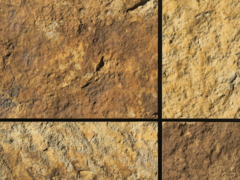 Fassade aus Natursteintafeln
