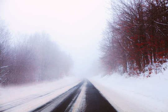 A misty road in winter