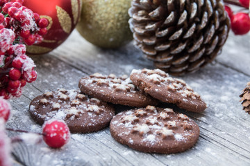 Cocoa cookies and spices on a wooden background near, Christmas decorations