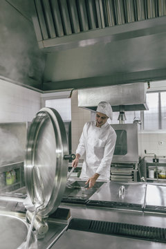 Chef Preparing Food in a Professional Kitchen