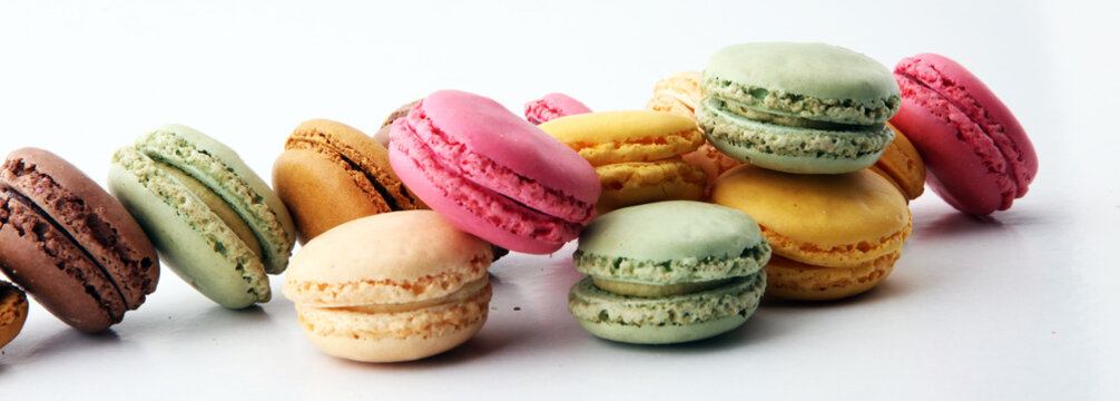 Sweet and colourful french macaroons or macaron on white background, Dessert