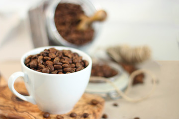 Coffee cup and beans brewing