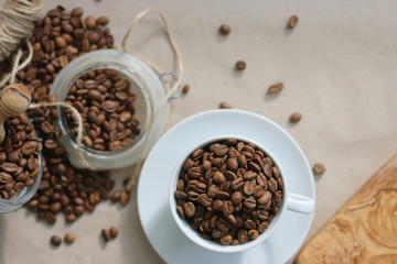 Fototapeta na wymiar Coffee cup and beans brewing