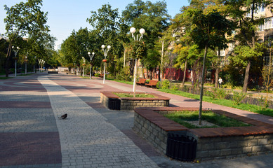 Square with colored tiles and benches