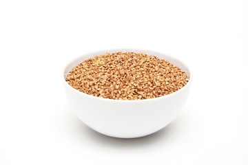 buckwheat grain in the white plate