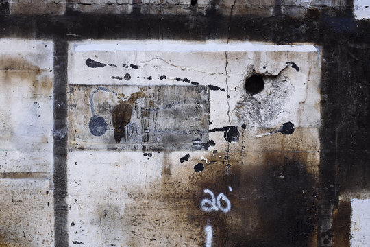 Detail of painted, old and weathered wall of demolished building