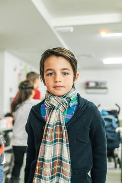 Portrait of a Cute Kid at School