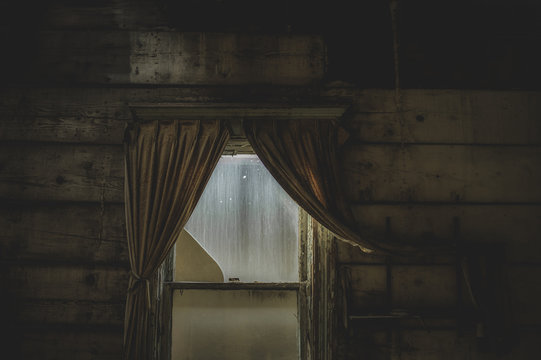 Creepy abandoned room with window