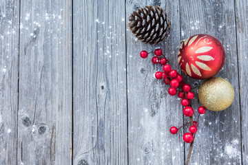 Christmas background with decorations on wooden board
