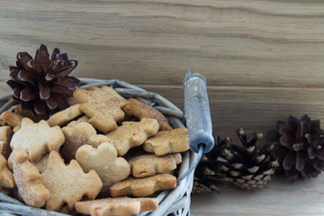 Old basket with Christmas cookies. Top view. Close-up. Selective focus. Horizontal.