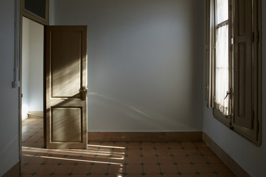 Interior of an old empty room with a window