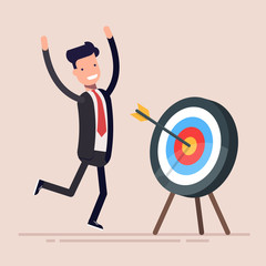 Happy businessman or manager rejoices near the hit target. The man hit the target exactly. Vector illustration in a flat style.