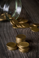 coins on wooden tables on stack 