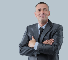 portrait of a friendly businessman in a gray business suit and t