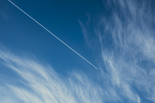 Airplane Contrail Across Sky