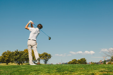 Golfer Playing Off the Tee Box