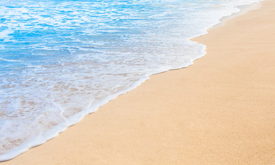 Fototapeta na wymiar Wave on sandy beach