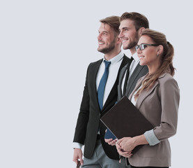 Happy business people in formalwear looking to the side.