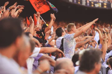 Foto op Plexiglas Blurred crowd of spectators on stadium at a sporting event © nonglak