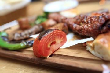 Grilled tomato with kebab