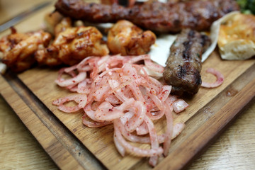 Pickled onions with kebab