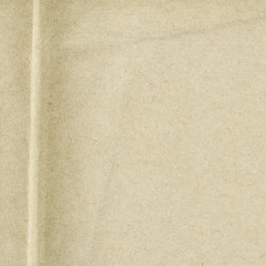 Recycled light brown or beige creased paper texture background