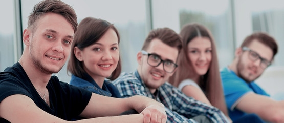 young group of people standing togethe