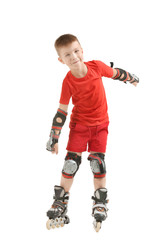 Funny boy on roller skates against white background