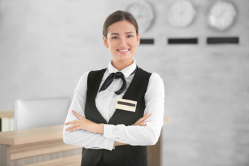 Female hotel receptionist at workplace