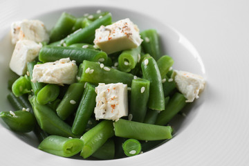 Plate with delicious green beans salad, closeup