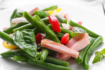 Plate with delicious green beans salad, closeup
