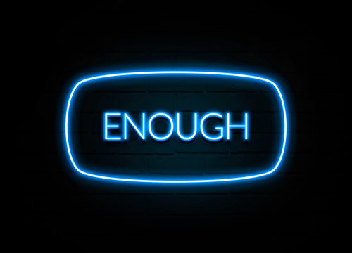 Enough  - colorful Neon Sign on brickwall