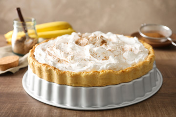 Delicious banana cake on table