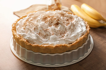 Delicious banana cake on table