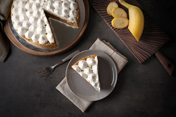 Delicious banana cake on table