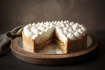 Delicious banana cake on table