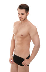 Fototapeta premium Sexy man in underwear on white background