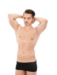 Fototapeta premium Sexy man in underwear on white background