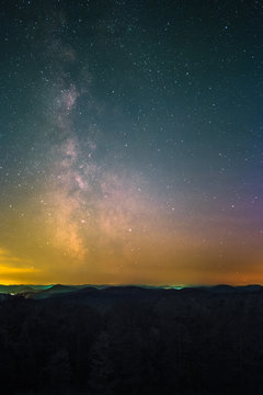 The center of the Milky Way as seen from the Schänzel Tower on the summit of the mountain Steigerkopf in the Palatinate Forest near Edenkoben in Germany.